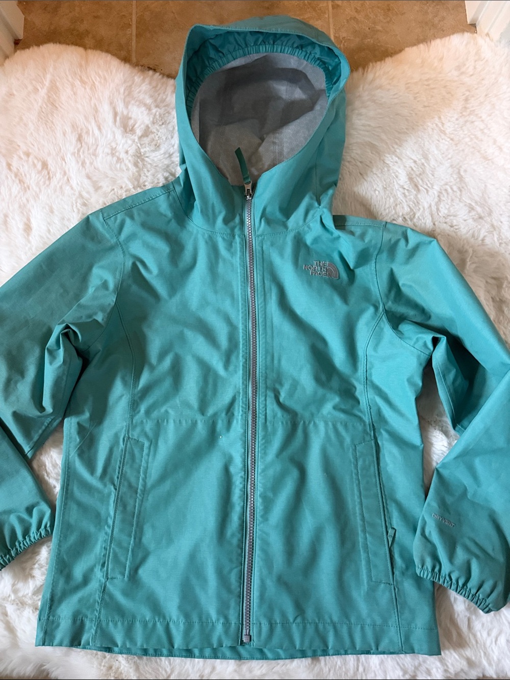 The North Face Teal Hooded Girl’s Rain Jacket